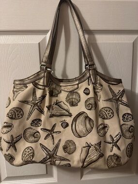 Coach Cream Canvas Tote with Metallic Gold Trim and Seashell Print